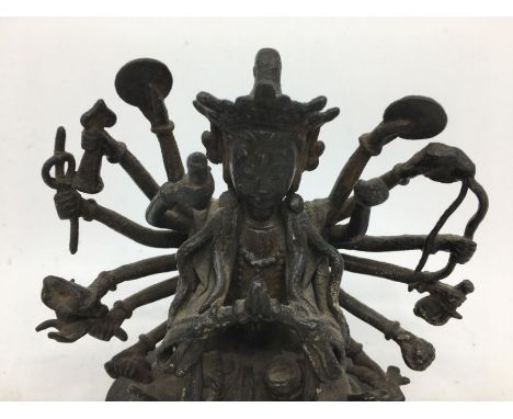 A Sino-Tibetan bronze figure of a deity. H:12.5cm