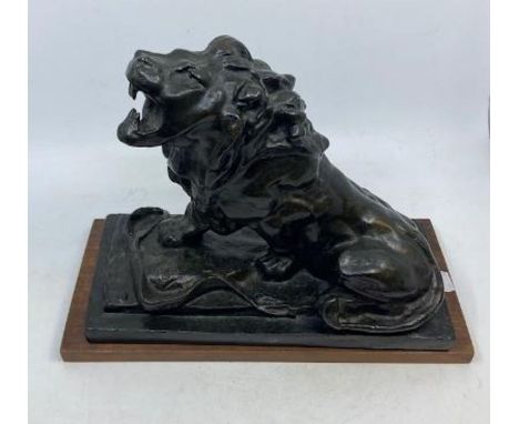 After Auguste Rodin 1840-1917 a finely modelled bronze "Weeping Lion"&nbsp;&nbsp;lion signed to body, later wooden stand&nbsp