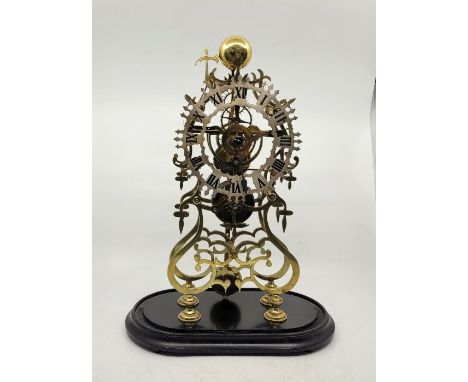 A brass skeleton clock, bell strike, having silvered Roman numeral chapter ring, on ebonised plinth and under glass dome, wid