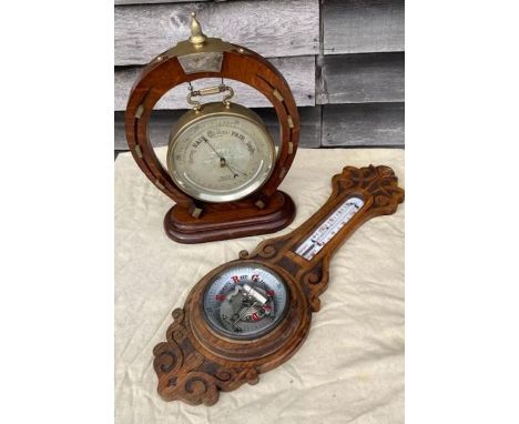 A large early 20th cent table barometer in the form of a gong and&nbsp; another barometer