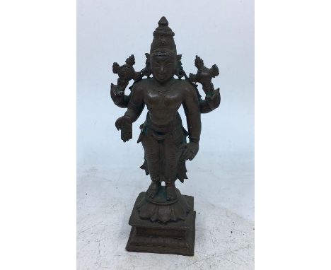An Indian bronze figure of a deity. H:14cm