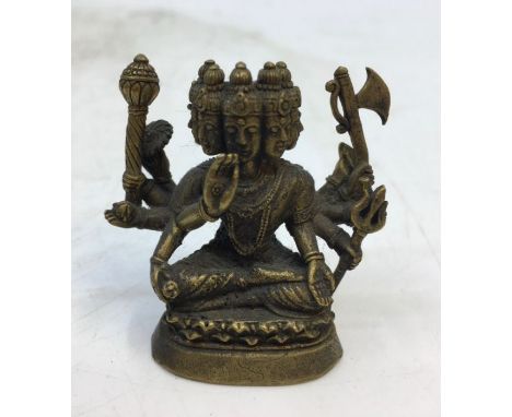 A small Sino-Tibetan bronze figure of a deity. H:3.2cm