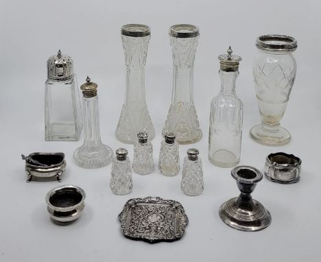 A pair of silver mounted glass posy vases, together with a set of four silver topped cut glass salt and peperettes, three var