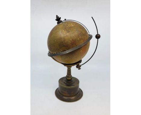 A Smith &amp; Son Ltd "The Empire Clock - Patent 19460" terrestrial globe mantle clock, having brass horizon ring engraved wi