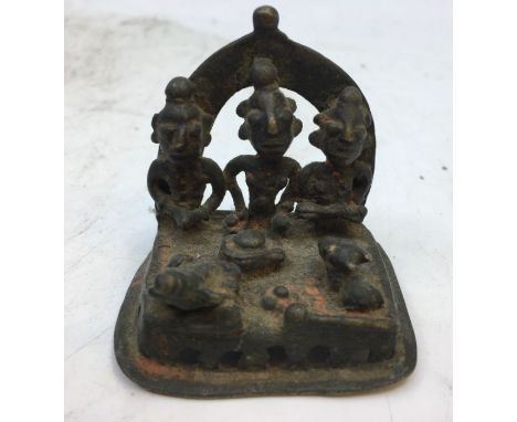 A small Indian bronze figure of a deity. H:4.5cm