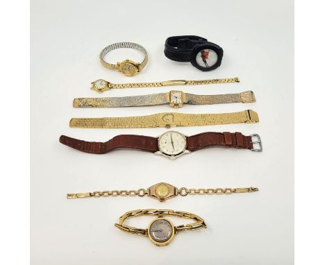 An 18ct. gold wristwatch, manual movement, to precious yellow metal expanding bracelet (gross weight 18.9g), together with an
