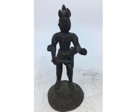 A small Indian bronze figure of a man playing a musical instrument. H:11.5cm