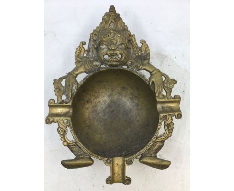 A Sino-Tibetan bronze lamp. H:6.5cm, diameter: 9cm