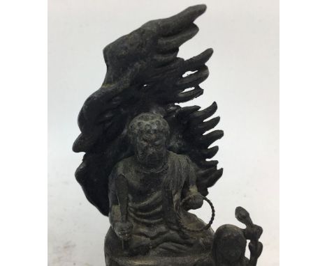 A Sino-Tibetan/ Chinese bronze figure of a deity. H:11cm