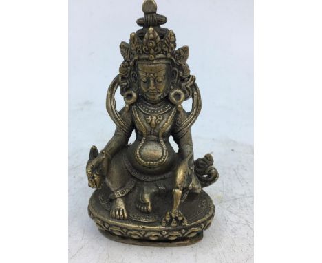 A Sino-Tibetan bronze figure of a deity. H:8cm