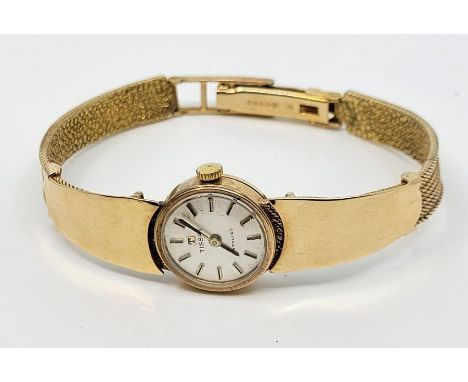 A Tissot 9ct. gold ladies' bracelet watch, manual movement, c.1969, having signed silvered circular dial with baton hour mark