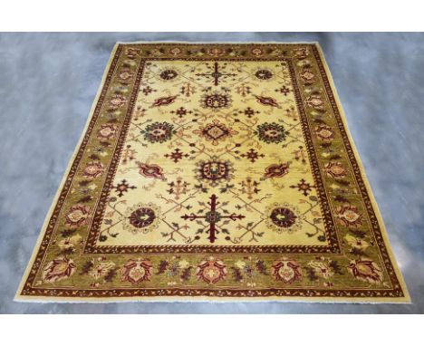 AN AFGHAN MAHAL WOOL CARPET (362 x 286cm)
Hand knotted wool pile with a soft golden field adorned with floral medallions and 