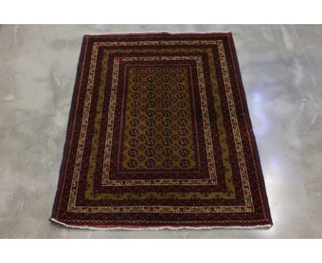 A KHAWAJA ROSHNI BOKHARA WOOL RUG (150 x 116 cm)
Hand knotted wool on cotton base with all over design
Ownership Statement: T