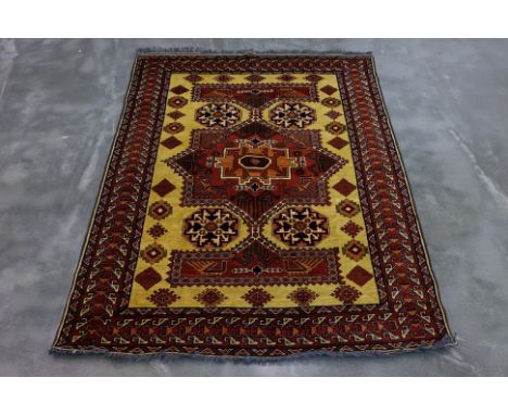 AN AFGHAN KARGHAI WOOL RUG (203 x 150cm)
Hand knotted wool with central star medallion
Ownership Statement: This item is offe