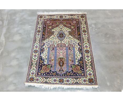 A PAK PERSIAN TREE OF LIFE WOOL RUG (155 x 95cm)
Hand knotted wool, intricate floral and other motifs
Ownership Statement: Th