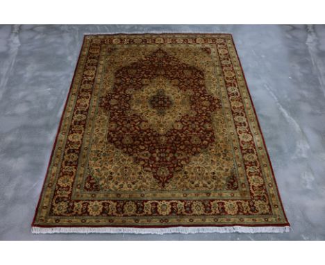 A KASHAN WOOL RUG (246 x 170cm)
Finely knotted wool pile, intricate medallion design
Ownership Statement: This item is offere