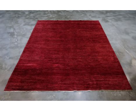 A CONTEMPORARY ZOLLANVARI WOOL CARPET (315 x 250cm)
Hand knotted wool, red field
Ownership Statement: This item is offered fo