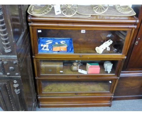 A three section Globe Wernike display bookcase.