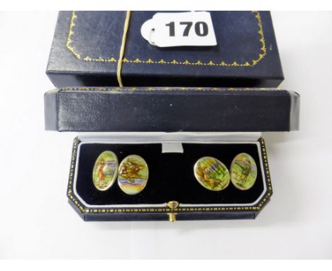 A boxed pair of silver and enamel hunting cuff links.