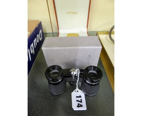 A pair of Concorde gift binoculars plus S.T. Dupont lighter (2).