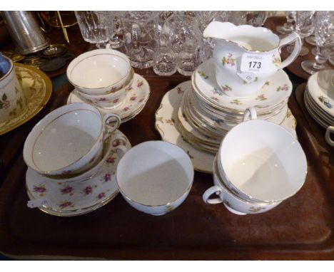 A Tray Containing Floral Pattern Teacups, Saucers and Side Plates 