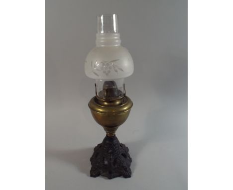 A Late Victorian Brass and Iron Oil Lamp with Etched Shade, 45cm High 