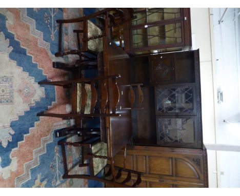 An Oak Dining Room Suite Comprising Draw Leaf Table, Four Ladder Back Chairs and Side Board Unit 