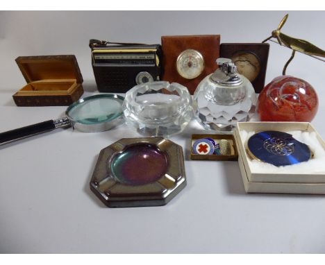 A Tray of Sundries to Include Brass Spitfire on Stand, Magnifying Glass, Costume Jewellery, Enamel Badges, Table Lighters Etc