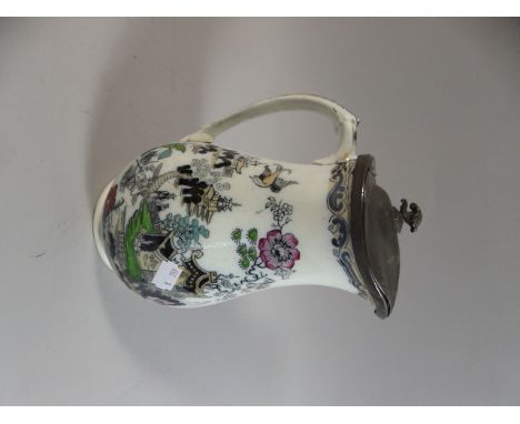 A Victorian Pewter Lidded Ceramic Hot Water Jug 