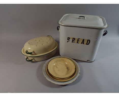 An Enamelled Bread Bin Together with an Oval Roasting Pan and Three Enamel Plates