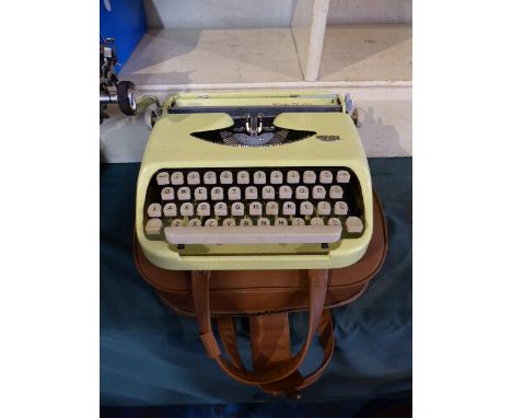 A Cased Vintage Royalite 100 Portable Manual Typewriter 