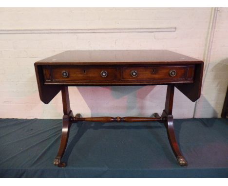 A Drop Leaf Sofa Table with Two Drawers Matched by Dummies, Claw Feet Culminating to Casters, 90cm Wide