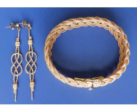 A '14k' bangle and matching pair of earrings – A.G.A. Correa  (3)