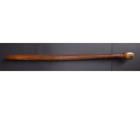 An Aboriginal Nula Nula stick, decorated with channelled fluting, 27”