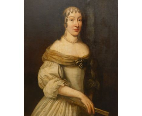 17th/18thC follower of Sir Peter Lely. Portrait of a lady half length, with ringlets and wearing a pearl necklace, holding a 