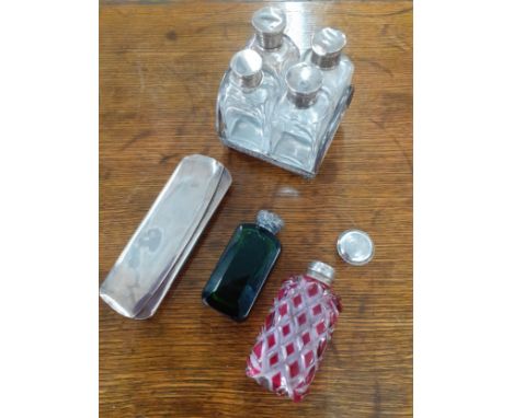 A group of small silver and white metal dressing table and other items to include scent bottles and a silver spectacle case w