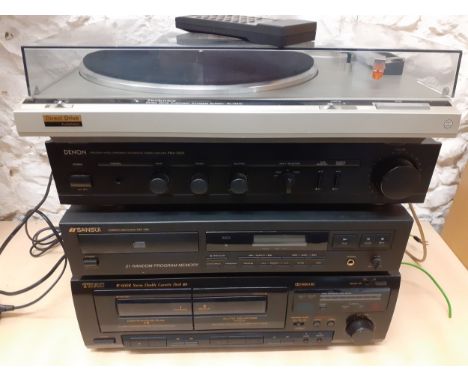 A late 20th Century stereo stacking system comprising a TEAC double cassette deck W-600R, a Sansui CD player CD-190, a Denon 