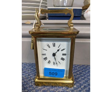 A modern antique style carriage clock by R & Co - Paris faced by a Roman dialLocation: 