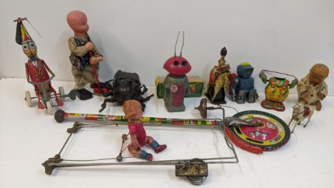 A selection of clockwork toys to include a Marx Smash Robot, Bandai beetle and othersLocation: 
