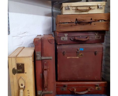 A collection of vintage suitcases to include leather examples and a trunk Location:BWR 