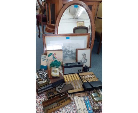 An oval oak framed wall mirror together with a print of Cliveden's backwater, an Arena tuner and Roberts radio, and vintage m