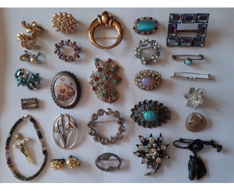 A Burberrys gold tone brooch (pre 1992 when they changed the brand name to Burberry), mixed vintage paste brooches to include