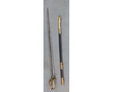 A Royal Navy 1827 pattern officers Sword, the 80cm blade having a single fuller, etched crown and Royal Navy motif, the half 