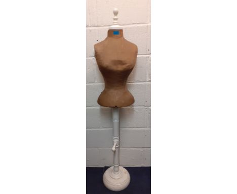 A vintage French Bust Company mannequin having a brown cloth torso on a white painted frame, 155cm High, non-adjustable. Loca