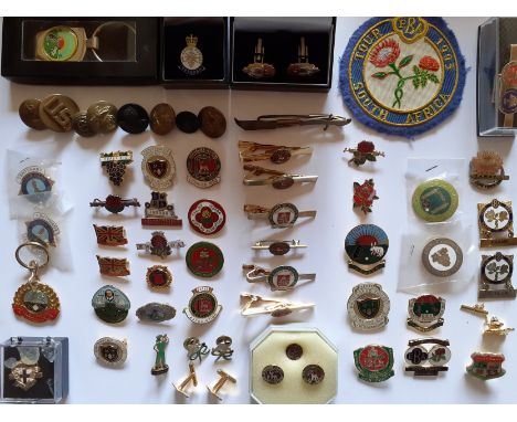 A quantity of late 20th Century and later enamelled and other badges, tie clips, cufflinks and keyrings to include the 1993 S