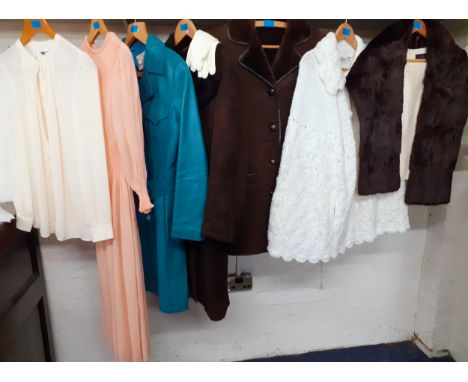 Two vintage ladies brown sheepskin coats, a 1970's turquoise leather coat (some foxing to collar),a mid 20th Century peach ch
