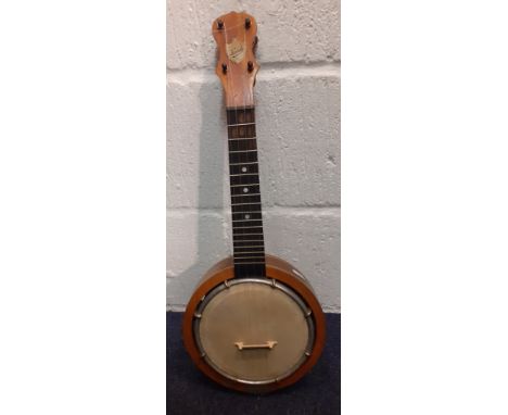 A small vintage Keech 4 string banjulele banjo, 22" long, pat no:21972023, no case. 