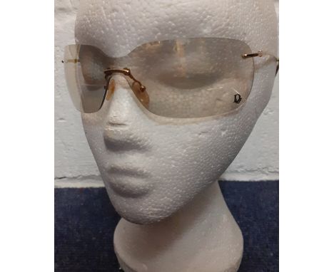 Christian Dior-A pair of vintage gold tone, frameless sunglasses having gold lenses together with an unrelated Roberto Cavall