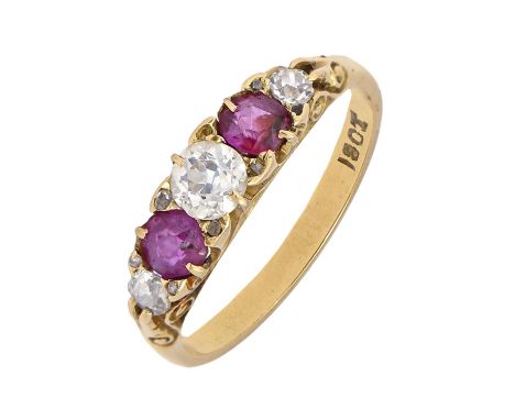 A ruby and diamond ring, early 20th c, with old cut diamonds, in gold, marked 18ct, 2.9g, size L One ruby slightly scratched,
