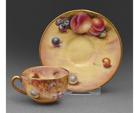 A Royal Worcester miniature teacup and saucer, late 20th c, painted by Paul English, signed, with fruit, saucer 8.5cm diam, p